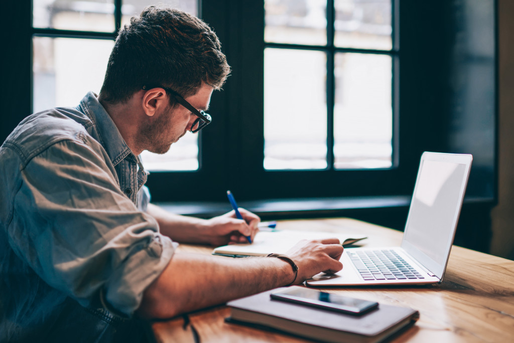 man using laptop