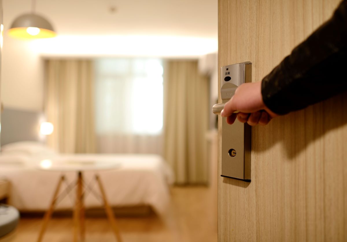 opening door to hotel room