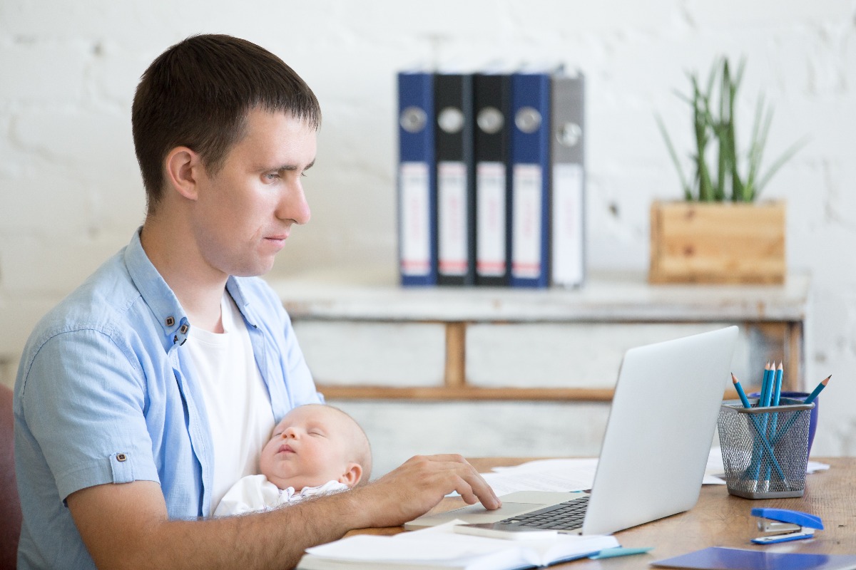 man holding a baby