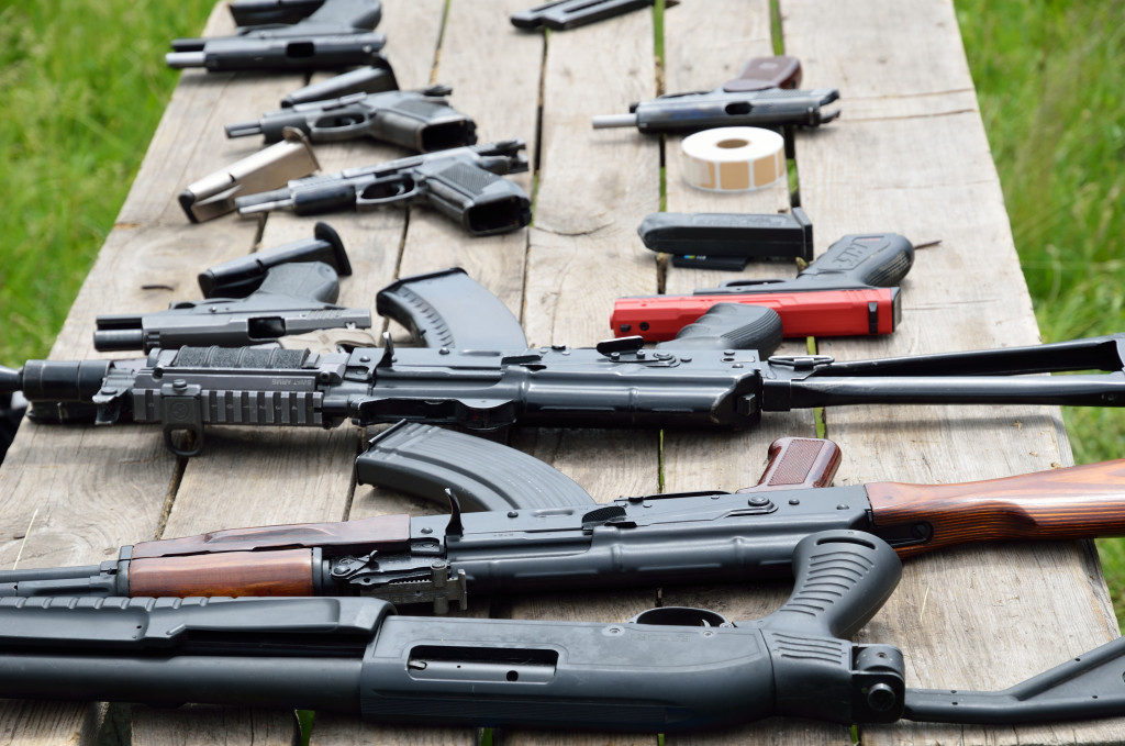 table filled with guns