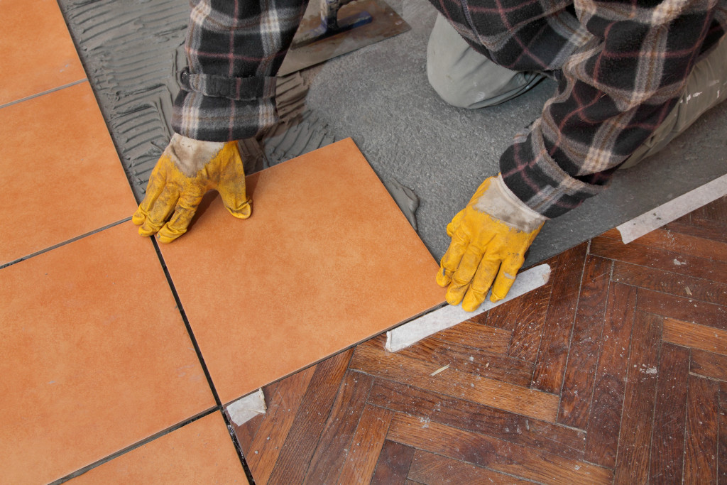 person doing the flooring