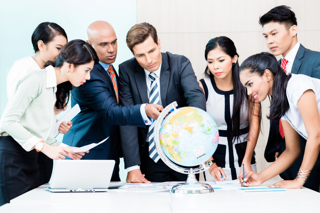 Employees discussing with boss