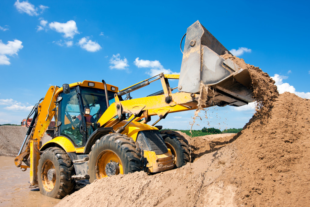 An excavator on the field