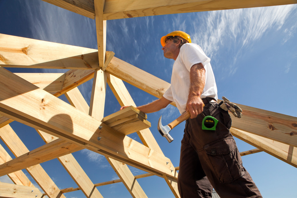 A roofer building a new roof