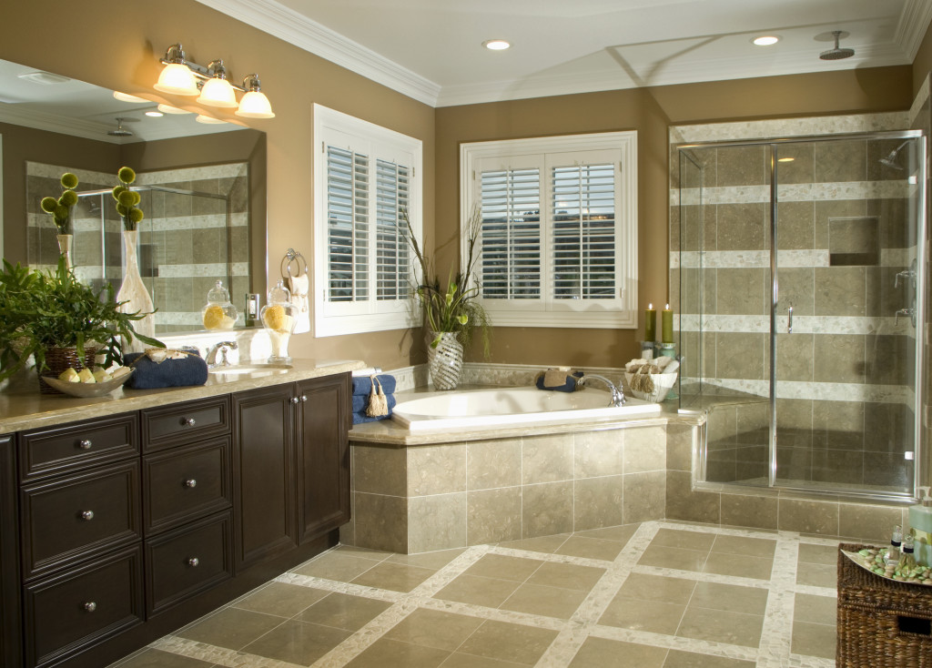 An image of a bathroom with various lighting fixtures