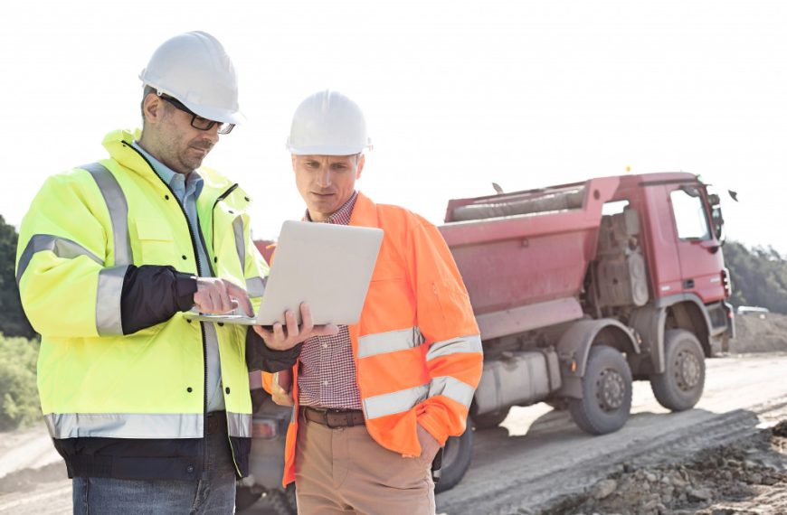 construction team reviewing a project on site