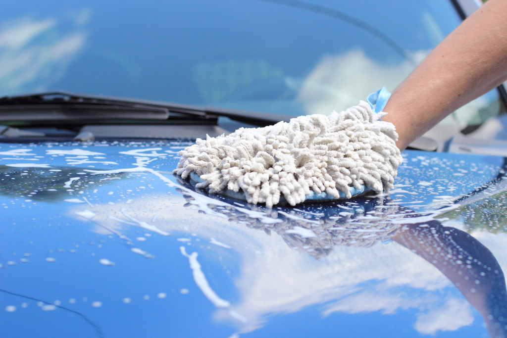 A man washing a car