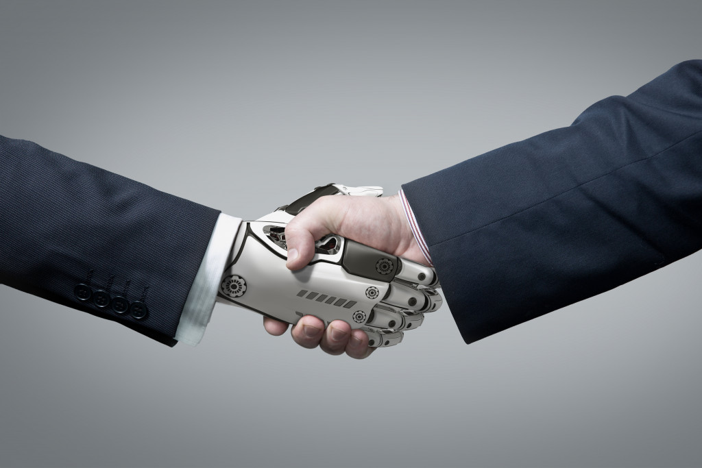 AI and human Shaking hands