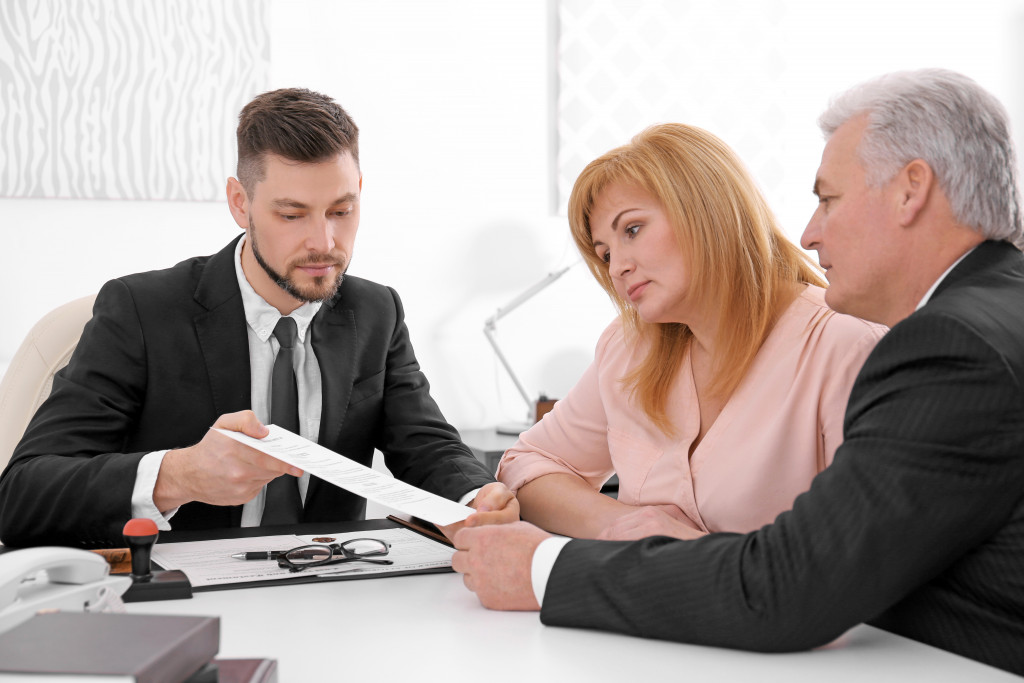 couple with a solicitor for last will