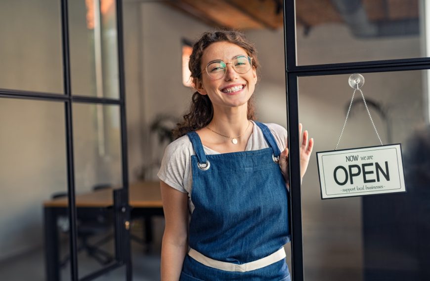 businesswoman standing at the cafeteria entrance