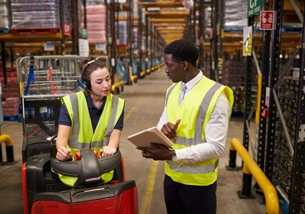 logistics technology being used by warehouse personnel