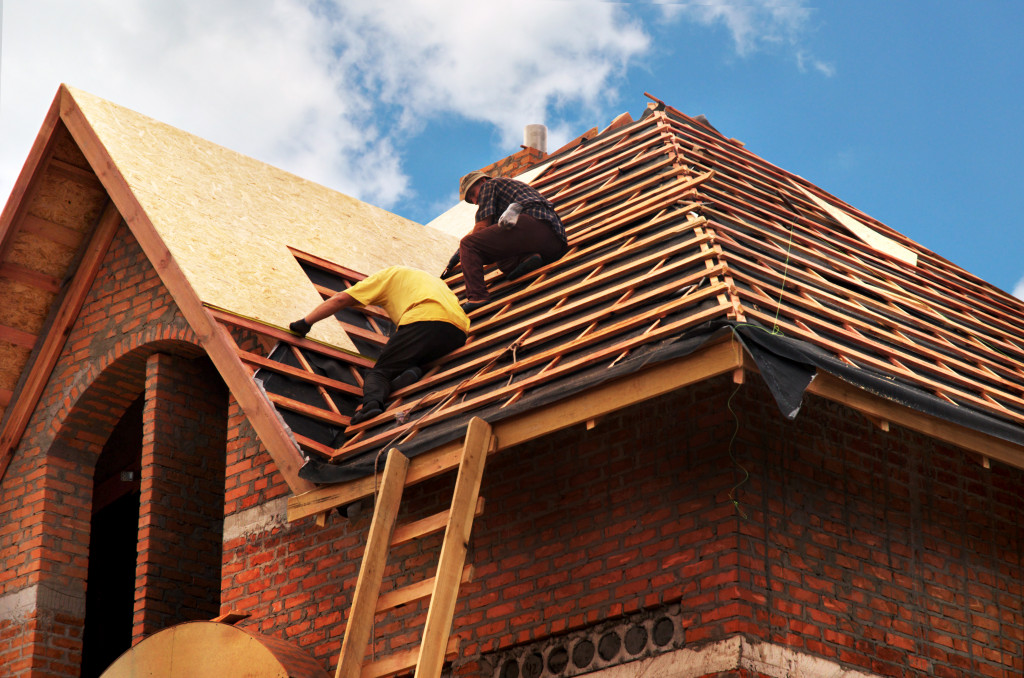 home repair in roof being done by professionals